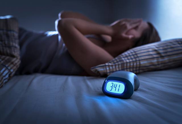 woman with sleep apnea up late at night?