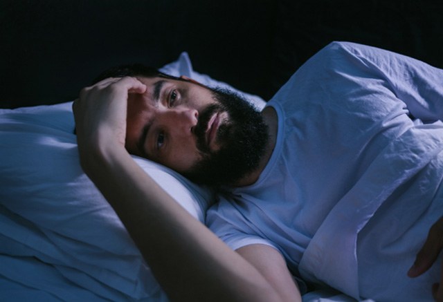 Man suffering from insomnia