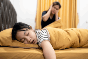 a child sleeping and snoring loudly